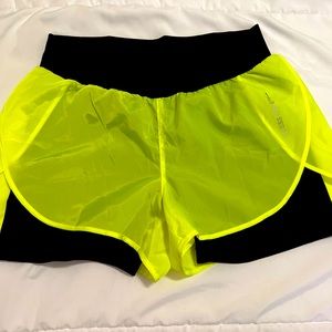 GUESS shorts, 2 in 1. New without tags. Excellent condition. Black and neon.